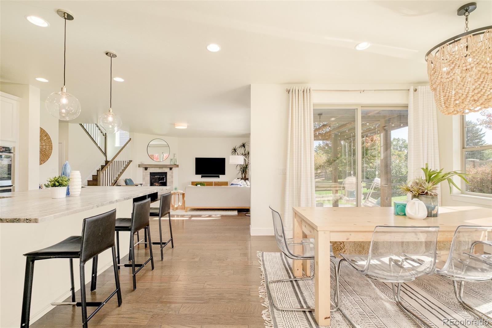 11880 West 38th Place Wheat Ridge, CO 80033 - Photo 14 of 30 a very nice looking living room with a large window and furniture