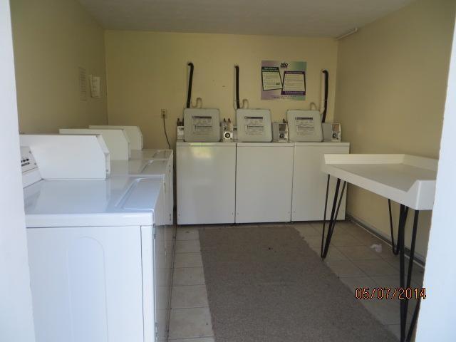 6 C & K Loop, Unit 6 Waterboro, ME 04087 - Photo 11 of 15 Laundry Room/Area. Coin operated...