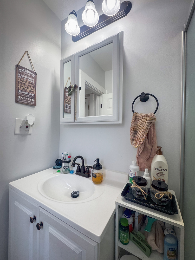 3701 Spring Grove Road Johnsburg, IL 60051 - Photo 11 of 46 a sink with a stove and cabinets