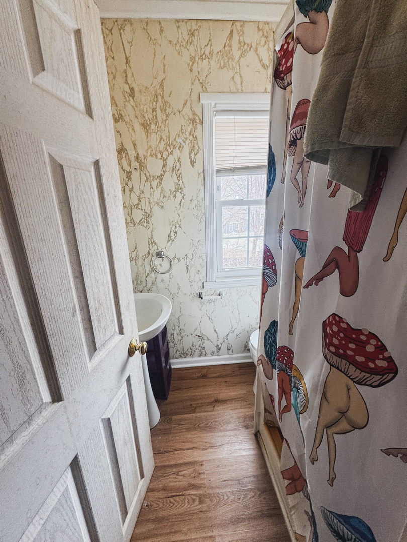 3701 Spring Grove Road Johnsburg, IL 60051 - Photo 20 of 46 a bathroom with a bathtub and shower