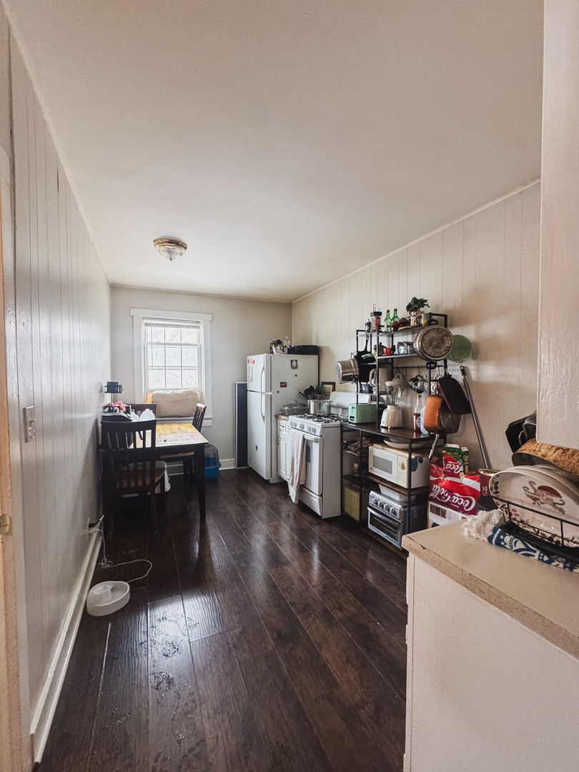 3701 Spring Grove Road Johnsburg, IL 60051 - Photo 23 of 46 a living room with furniture and a wooden floor