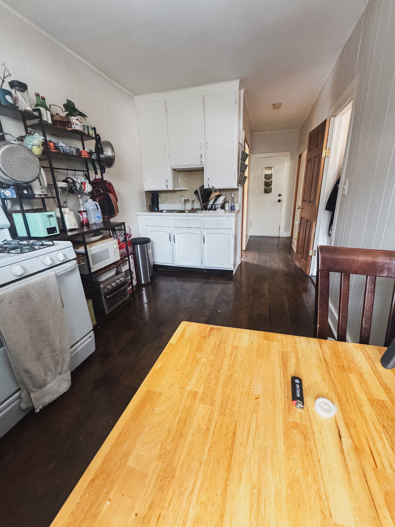 3701 Spring Grove Road Johnsburg, IL 60051 - Photo 24 of 46 a living room with a bed and furniture in it