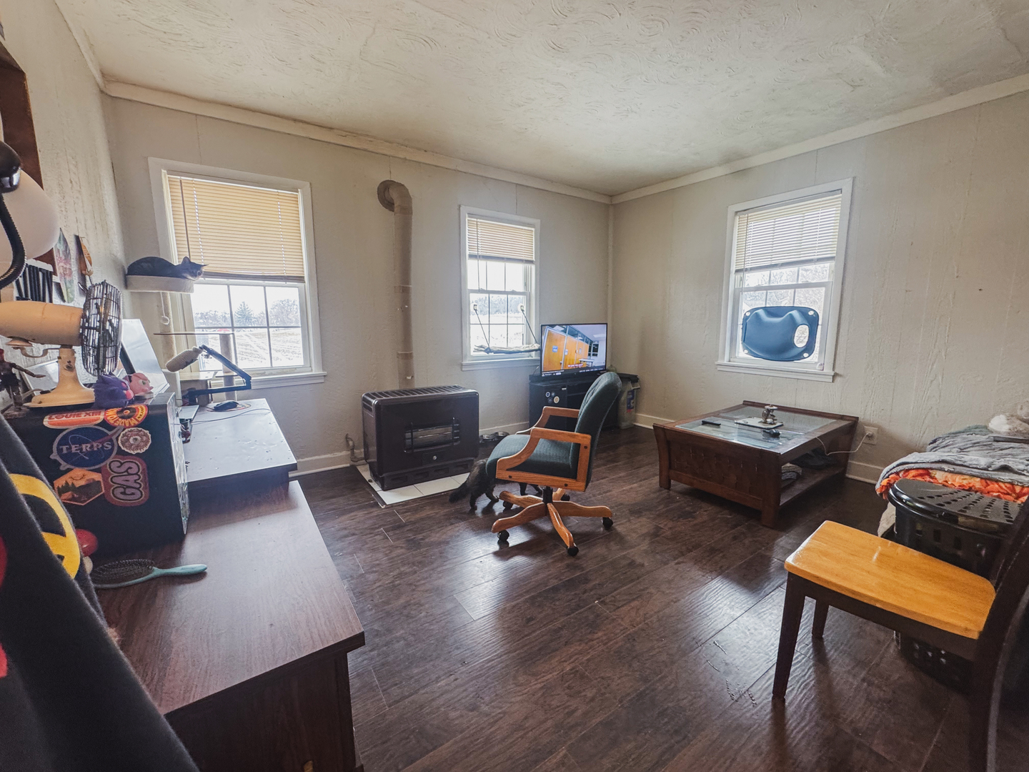 3701 Spring Grove Road Johnsburg, IL 60051 - Photo 27 of 46 a living room with furniture a flat screen tv and a window