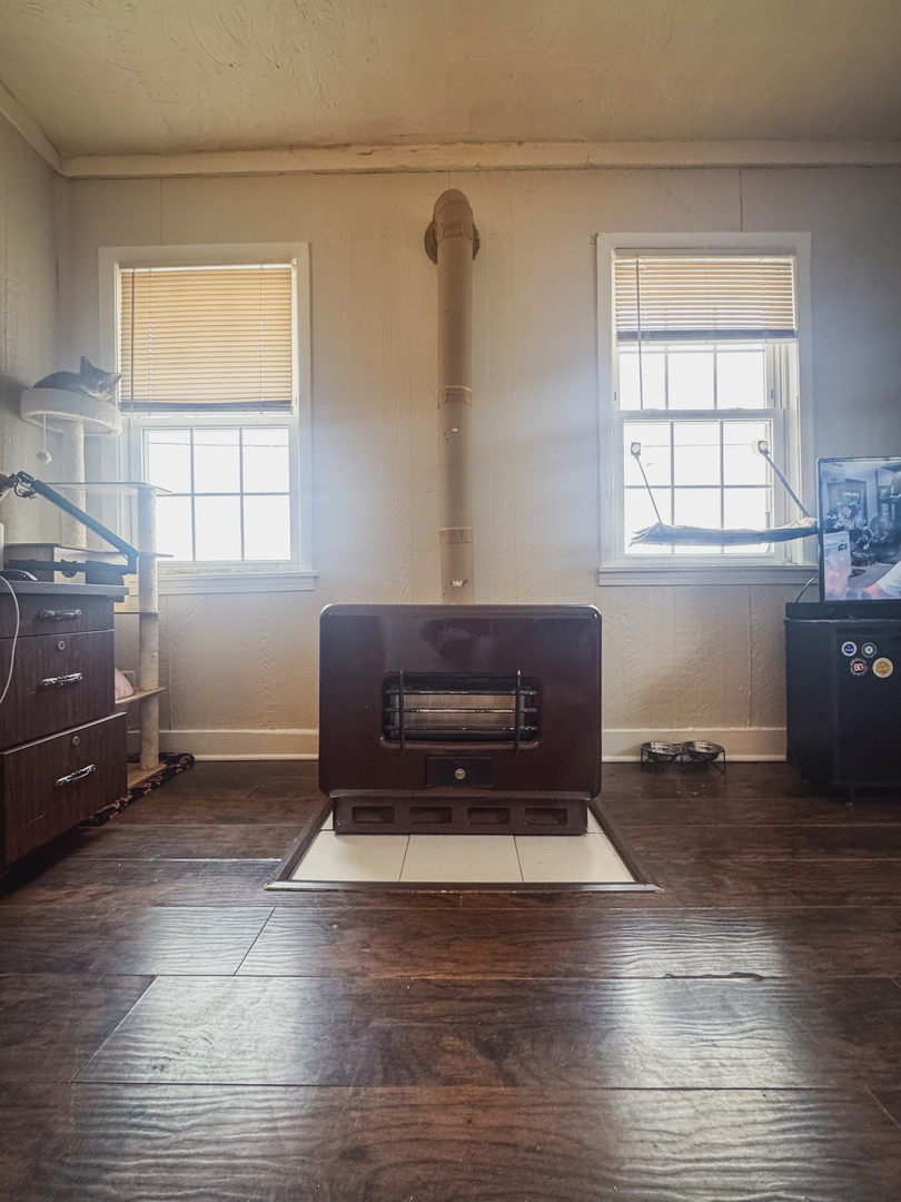 3701 Spring Grove Road Johnsburg, IL 60051 - Photo 28 of 46 a living room with a couch and a window