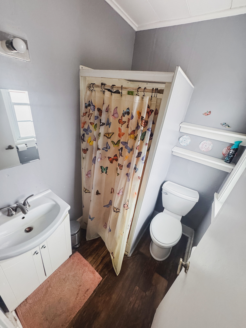 3701 Spring Grove Road Johnsburg, IL 60051 - Photo 32 of 46 a bathroom with a sink toilet and shower