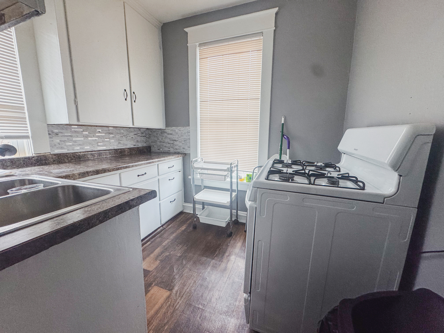 3701 Spring Grove Road Johnsburg, IL 60051 - Photo 34 of 46 a kitchen with sink cabinets and stove