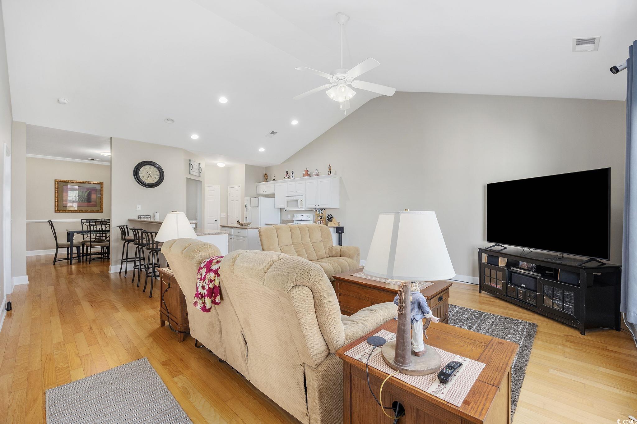 284 Viareggio Road, Unit 284 Myrtle Beach, SC 29579 - Photo 7 of 40 Living room featuring light hardwood / wood-style