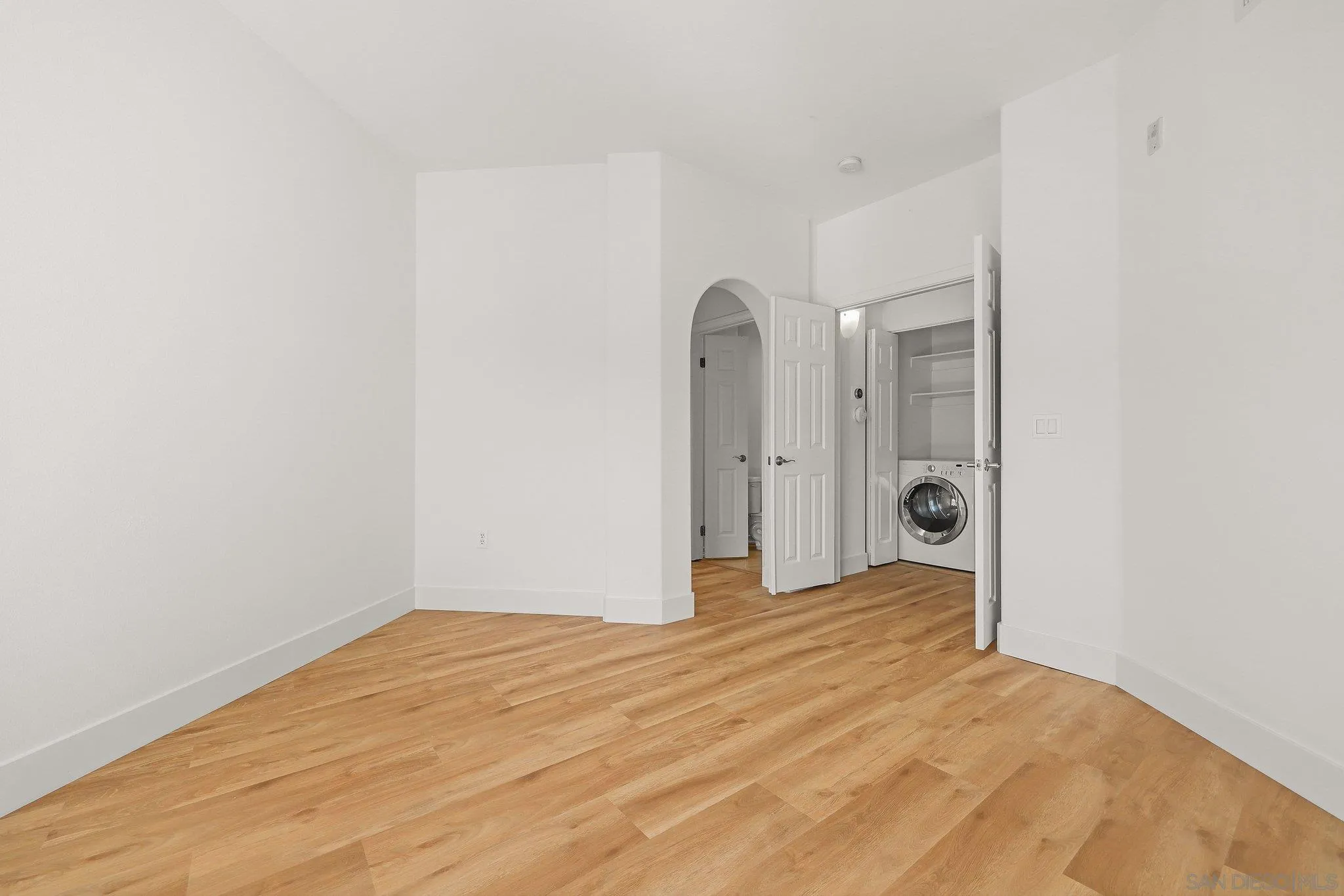 2708 Lake Pointe Drive, Unit 209 Spring Valley, CA 91977 - Photo 16 of 59 a view of empty room with wooden floor