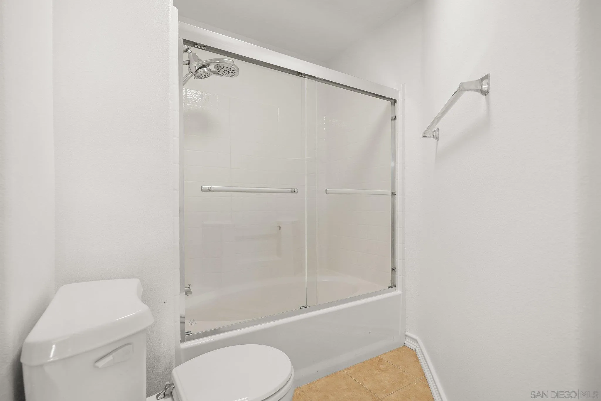 2708 Lake Pointe Drive, Unit 209 Spring Valley, CA 91977 - Photo 20 of 59 a bathroom with a toilet and a shower