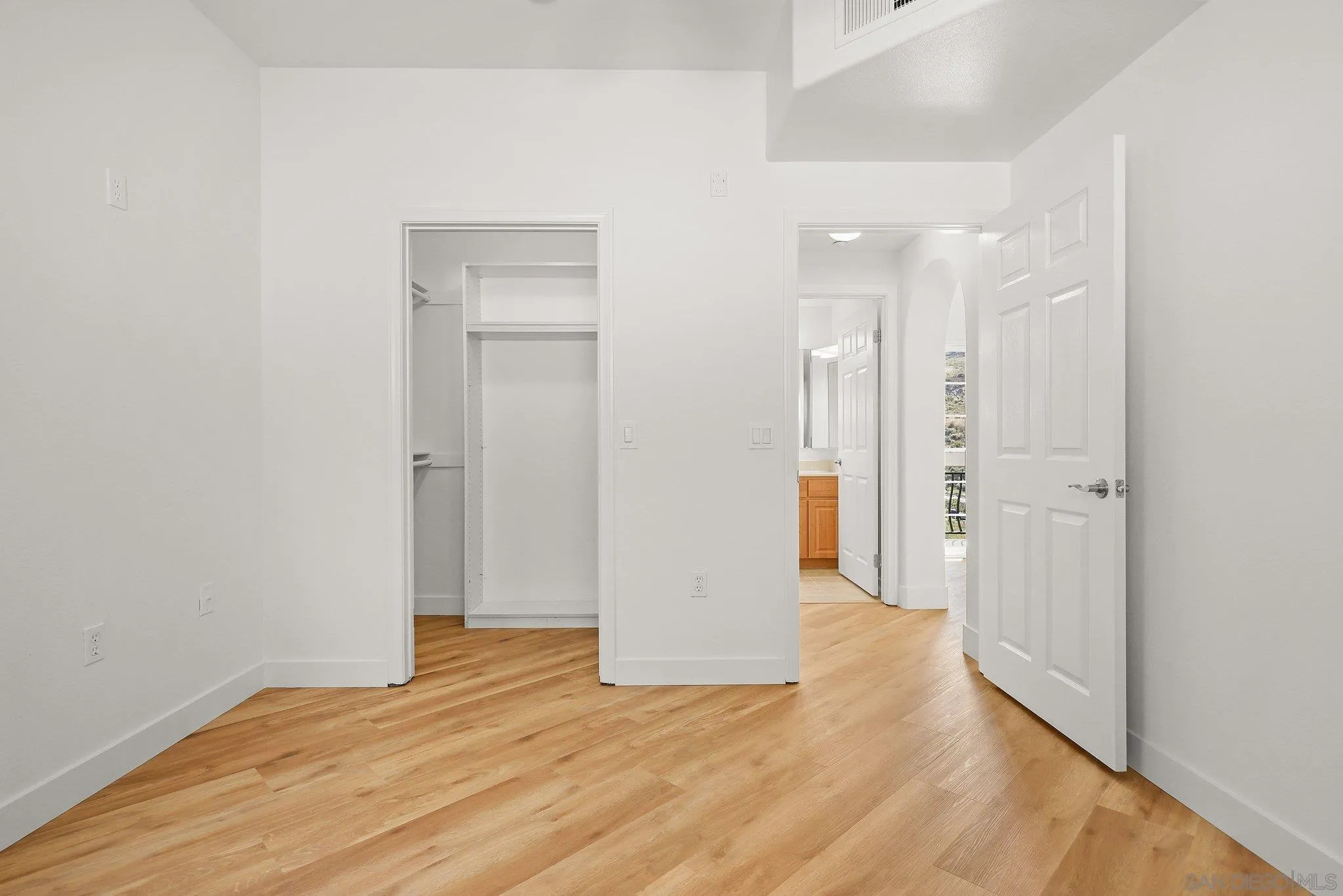 2708 Lake Pointe Drive, Unit 209 Spring Valley, CA 91977 - Photo 23 of 59 a view of empty room with wooden floor