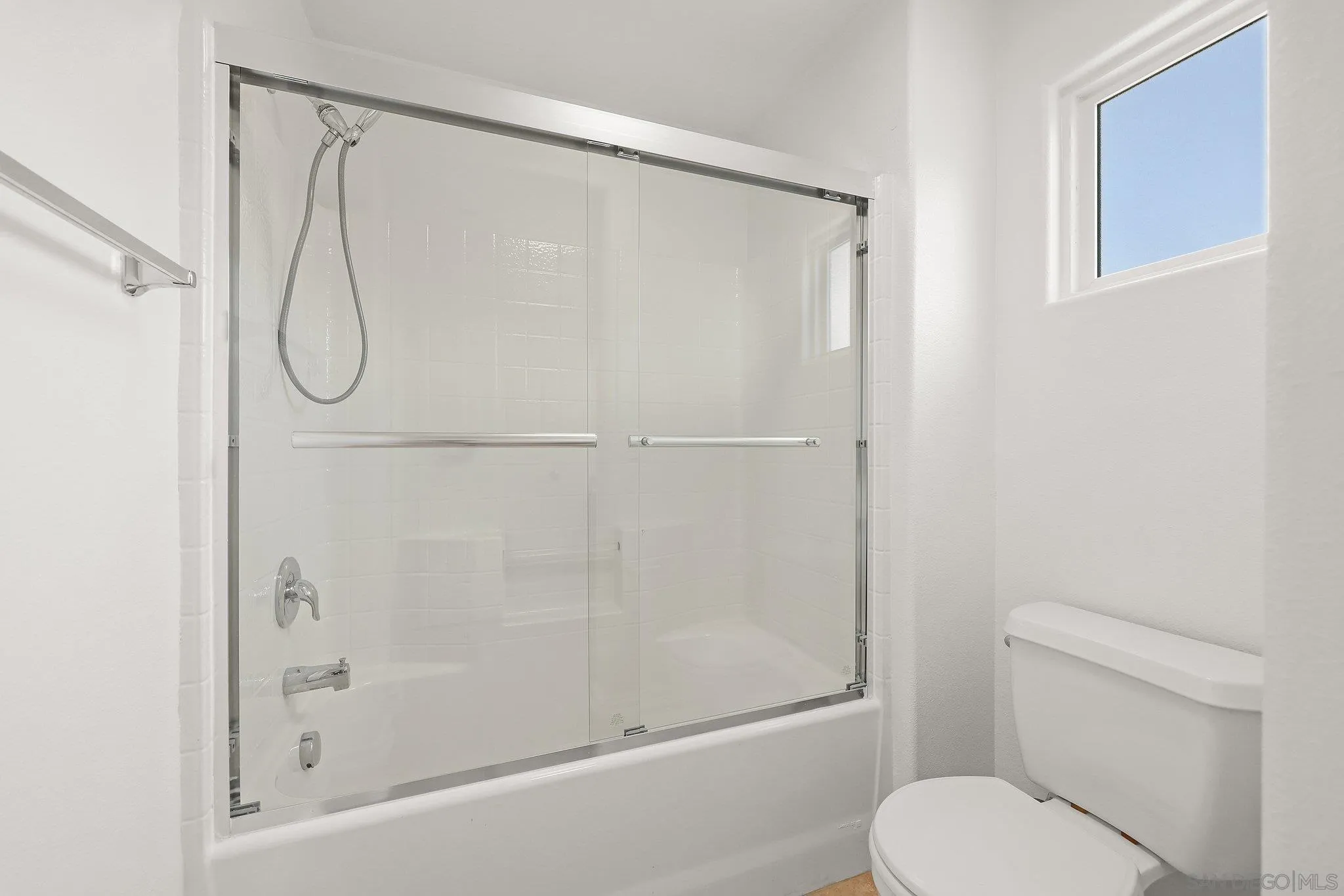 2708 Lake Pointe Drive, Unit 209 Spring Valley, CA 91977 - Photo 26 of 59 a bathroom with a shower toilet and sink