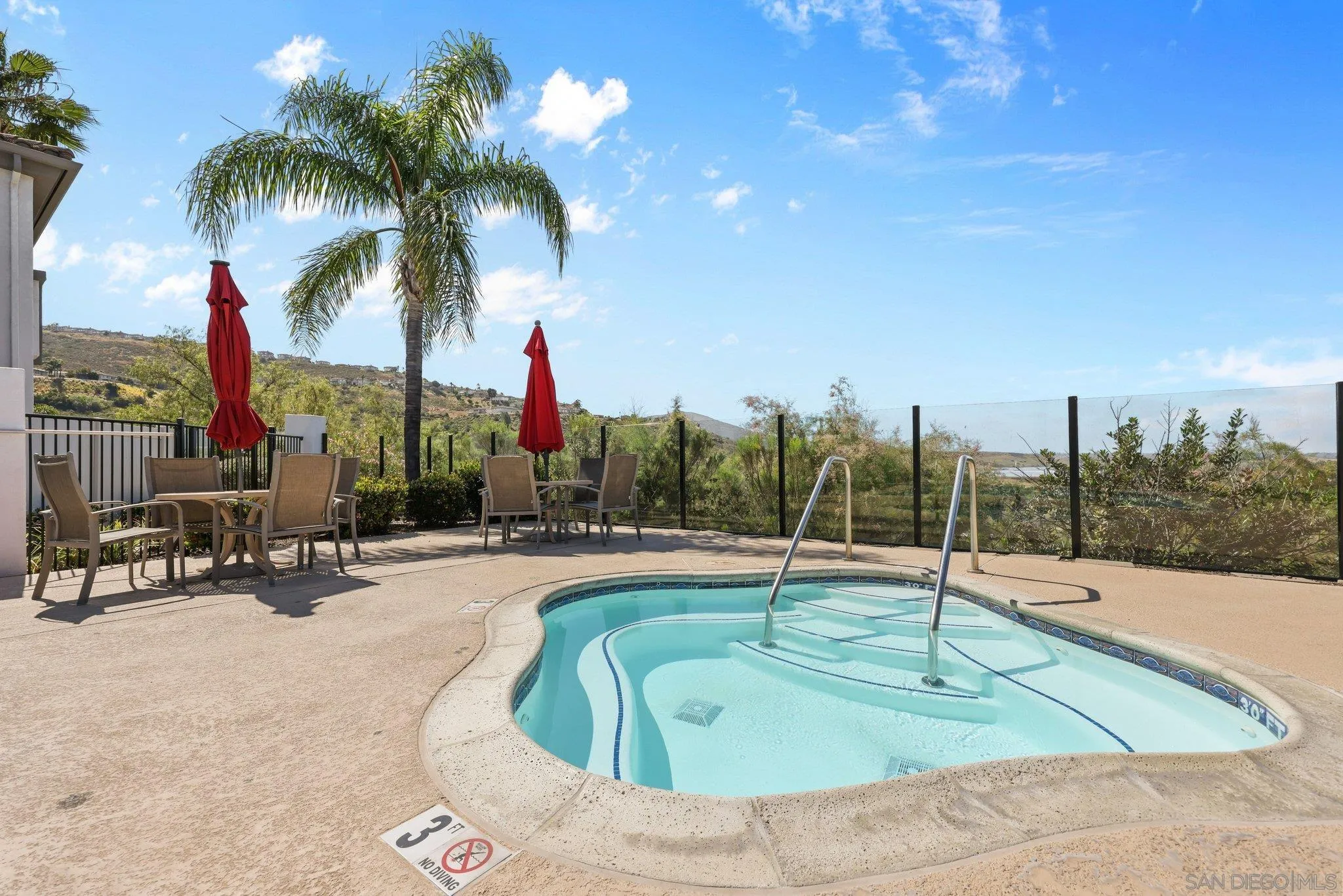 2708 Lake Pointe Drive, Unit 209 Spring Valley, CA 91977 - Photo 31 of 59 a swimming pool with outdoor seating and yard