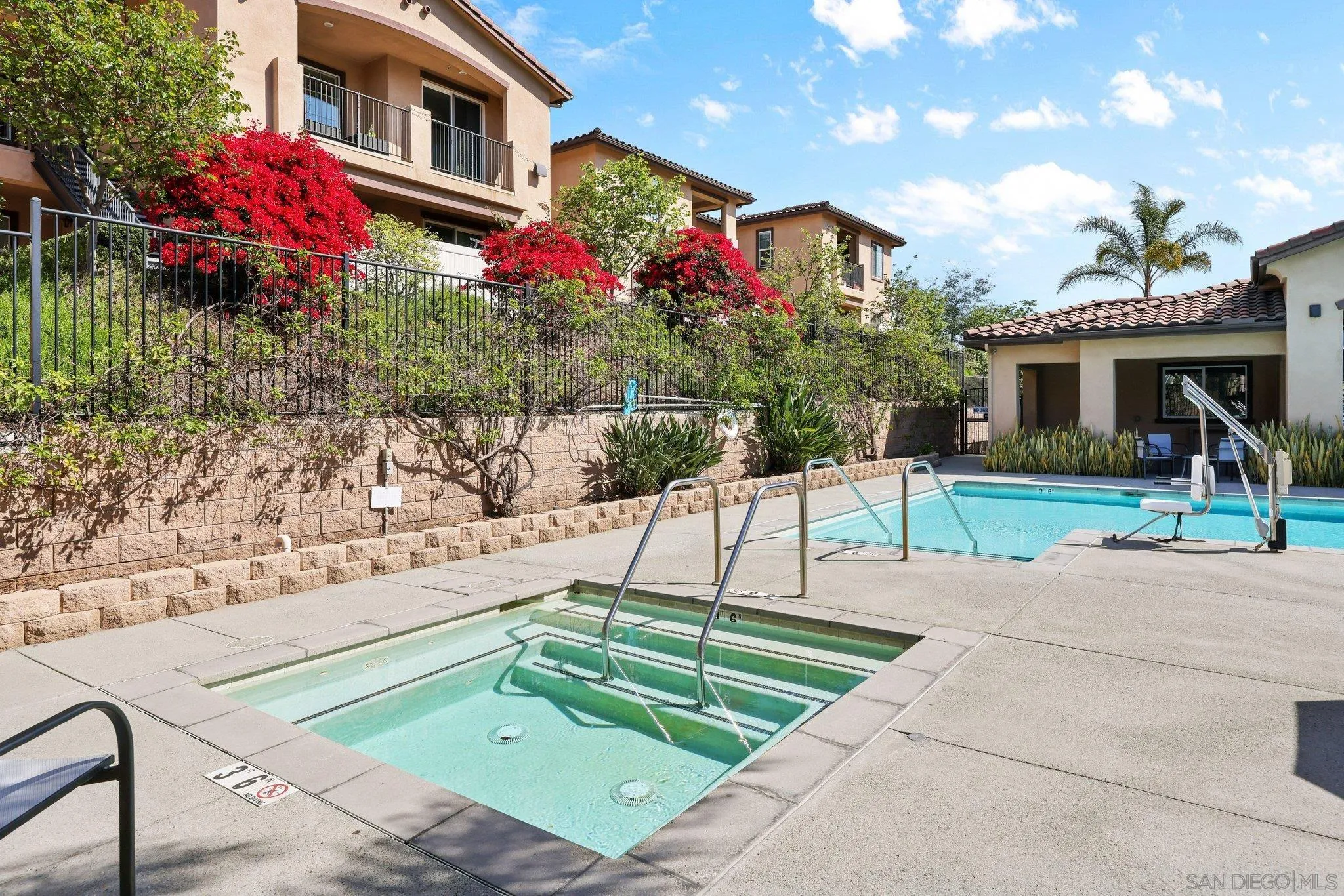 2708 Lake Pointe Drive, Unit 209 Spring Valley, CA 91977 - Photo 33 of 59 a front view of a house with a yard
