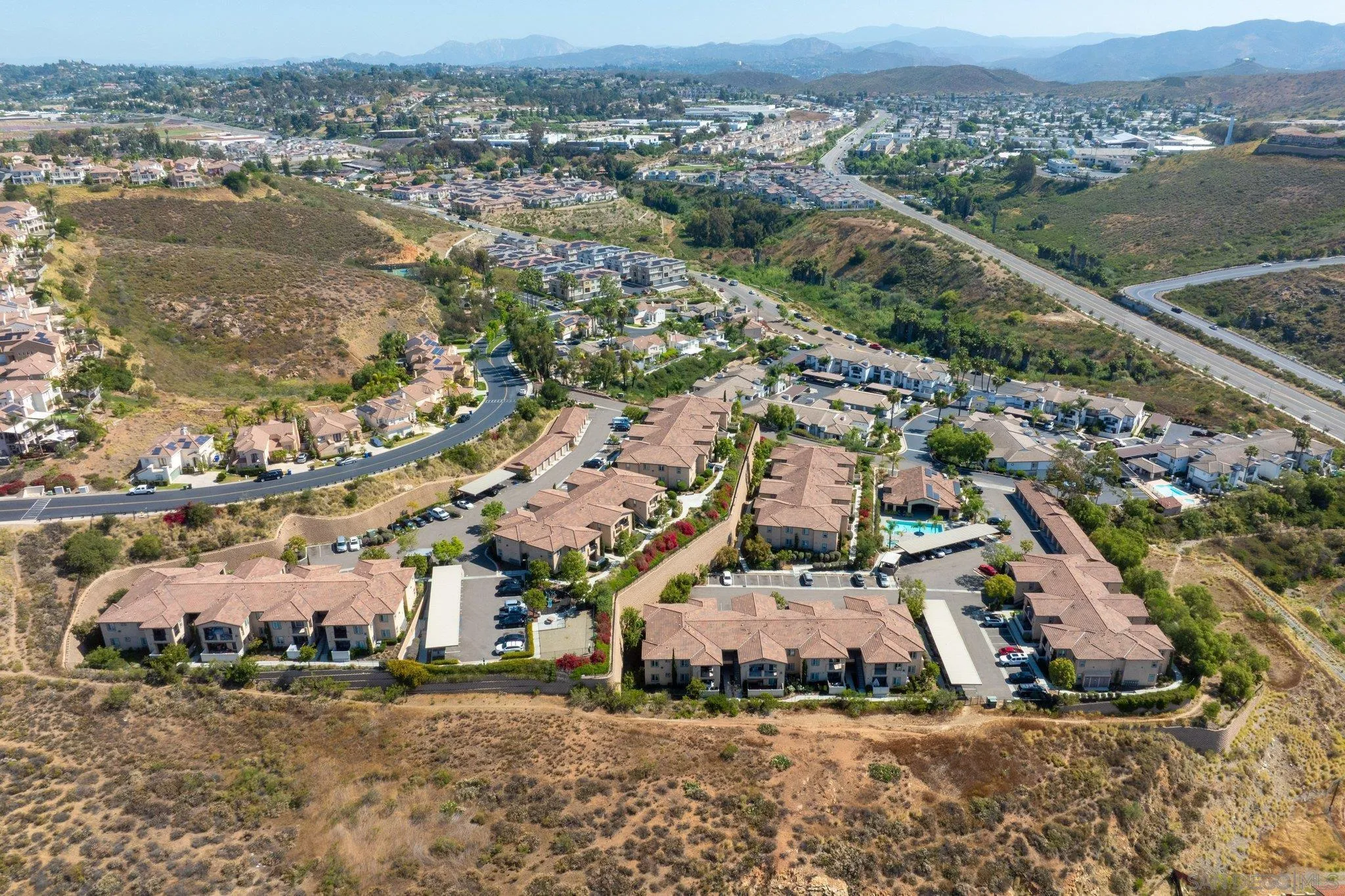 2708 Lake Pointe Drive, Unit 209 Spring Valley, CA 91977 - Photo 35 of 59 an aerial view of residential houses with outdoor space