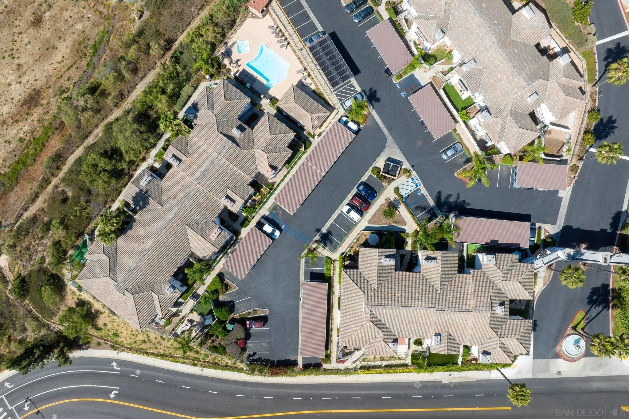 2708 Lake Pointe Drive, Unit 209 Spring Valley, CA 91977 - Photo 52 of 59 an aerial view of multiple houses with a street