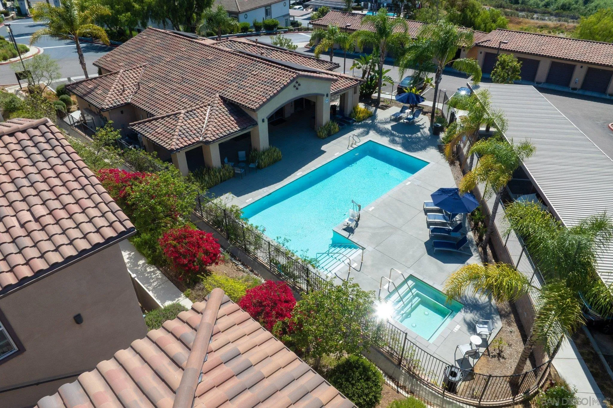 2708 Lake Pointe Drive, Unit 209 Spring Valley, CA 91977 - Photo 55 of 59 an aerial view of a house with a garden and swimming pool