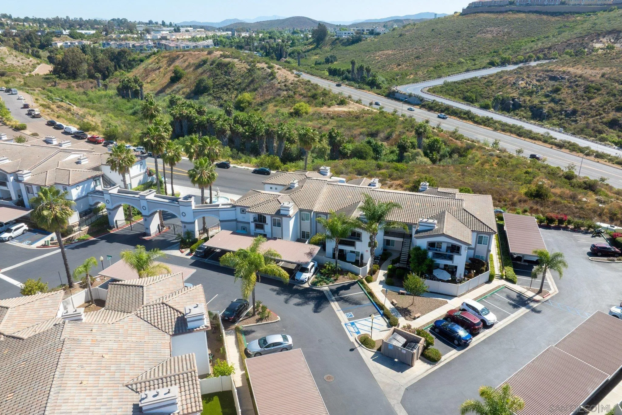 2708 Lake Pointe Drive, Unit 209 Spring Valley, CA 91977 - Photo 56 of 59 an aerial view of residential houses with outdoor space