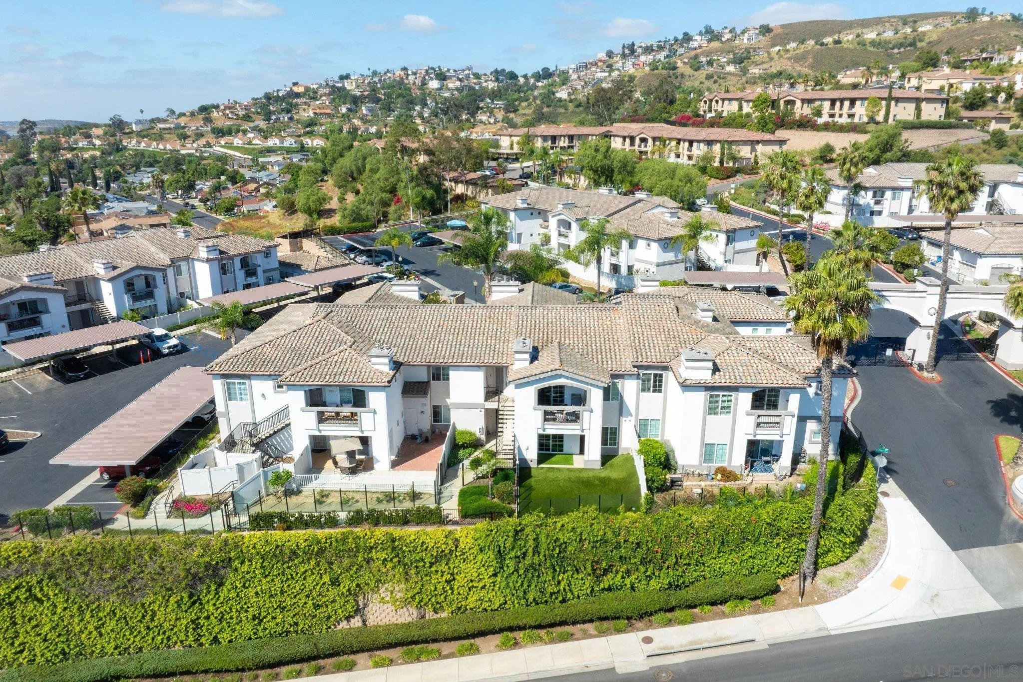 2708 Lake Pointe Drive, Unit 209 Spring Valley, CA 91977 - Photo 57 of 59 an aerial view of residential houses with outdoor space
