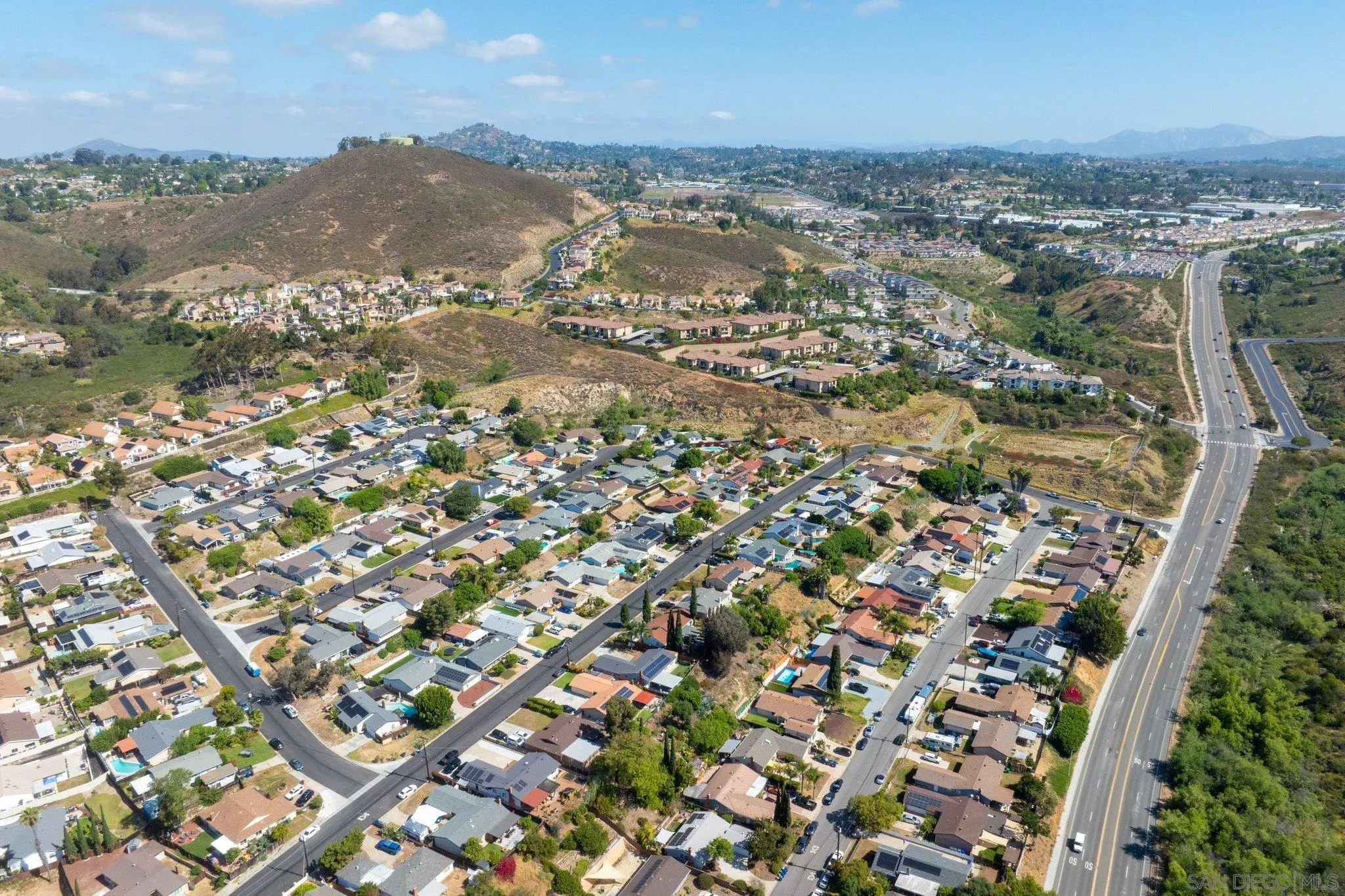 2708 Lake Pointe Drive, Unit 209 Spring Valley, CA 91977 - Photo 59 of 59 an aerial view of residential houses with outdoor space