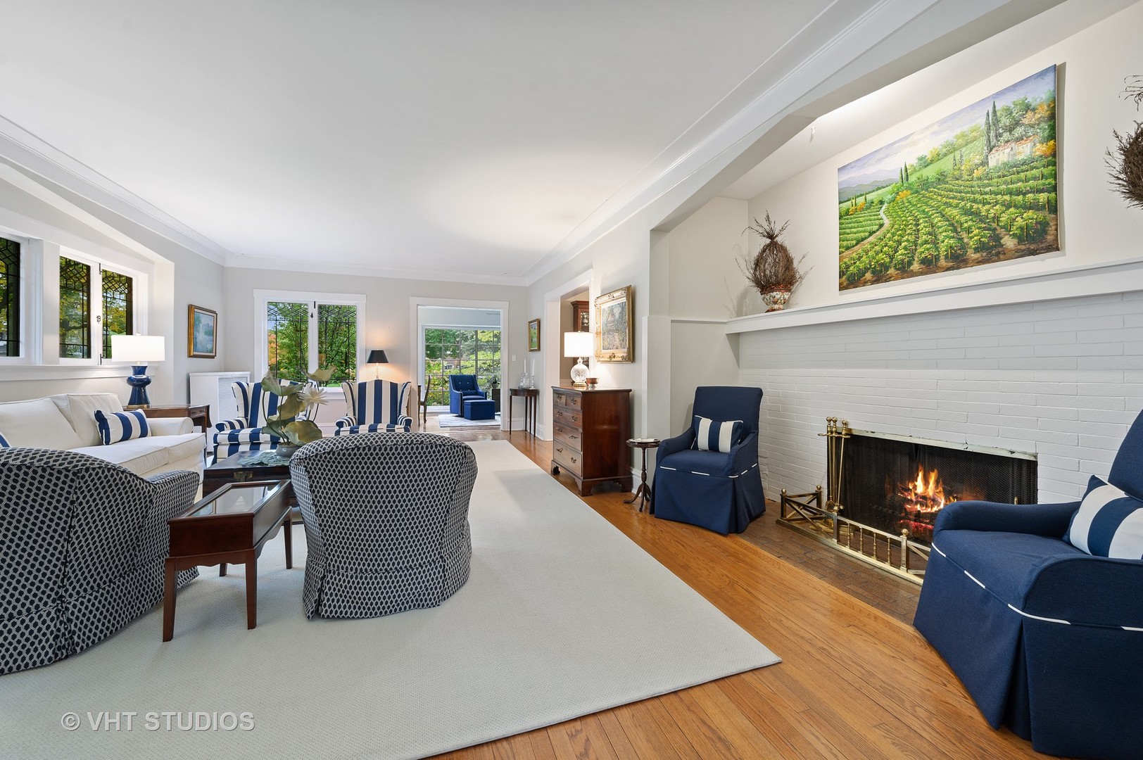 304 Cumnor Road Kenilworth, IL 60043 - Photo 11 of 40 a living room with furniture and a fireplace