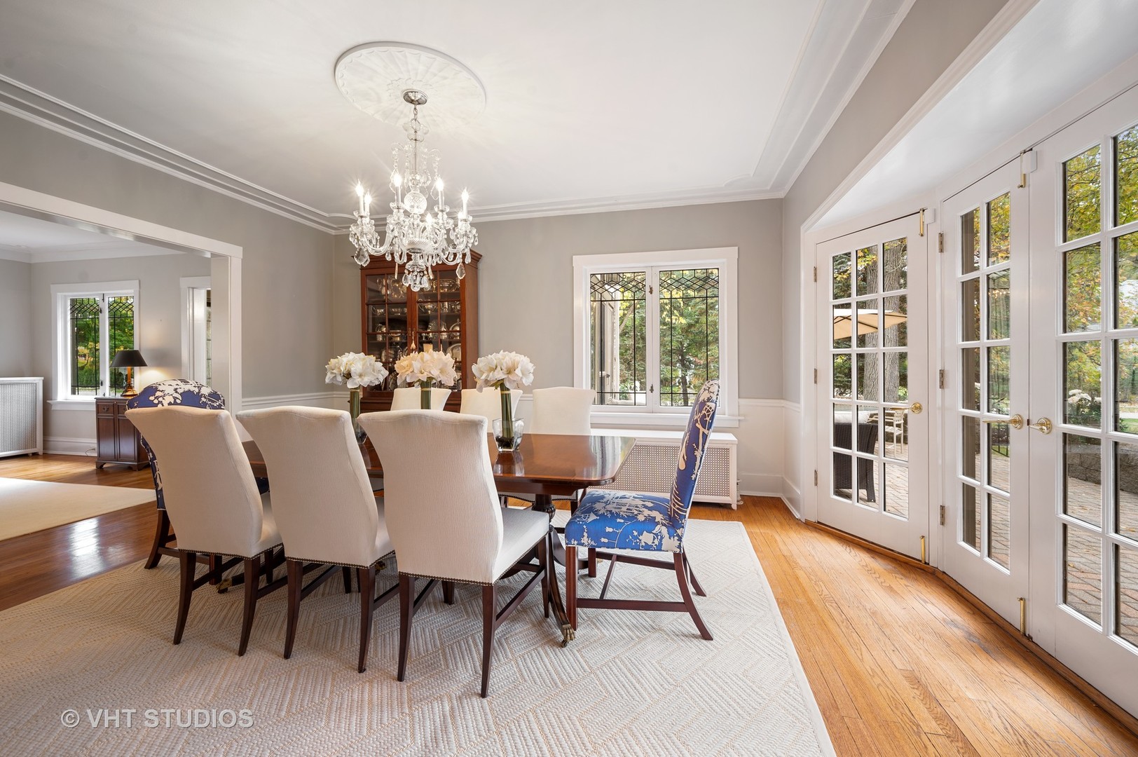 304 Cumnor Road Kenilworth, IL 60043 - Photo 14 of 40 a view of a dining room with furniture window and wooden floor