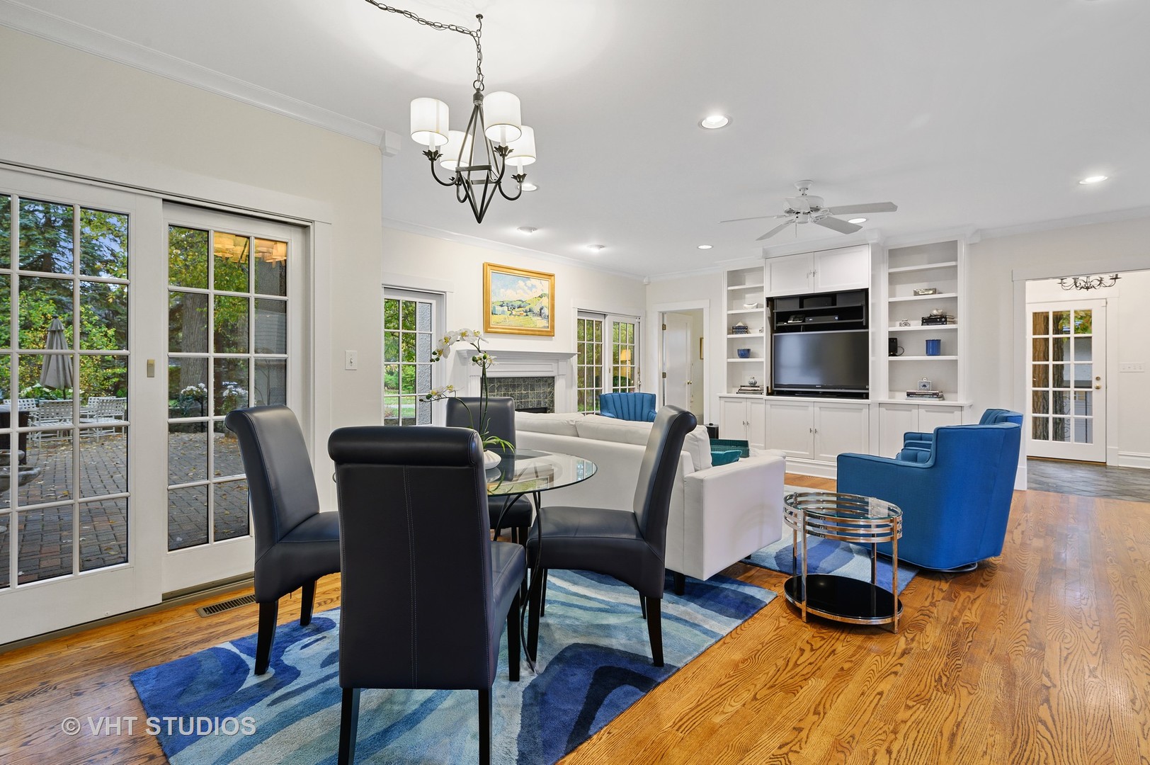 304 Cumnor Road Kenilworth, IL 60043 - Photo 16 of 40 a view of a dining room with furniture a rug and wooden floor