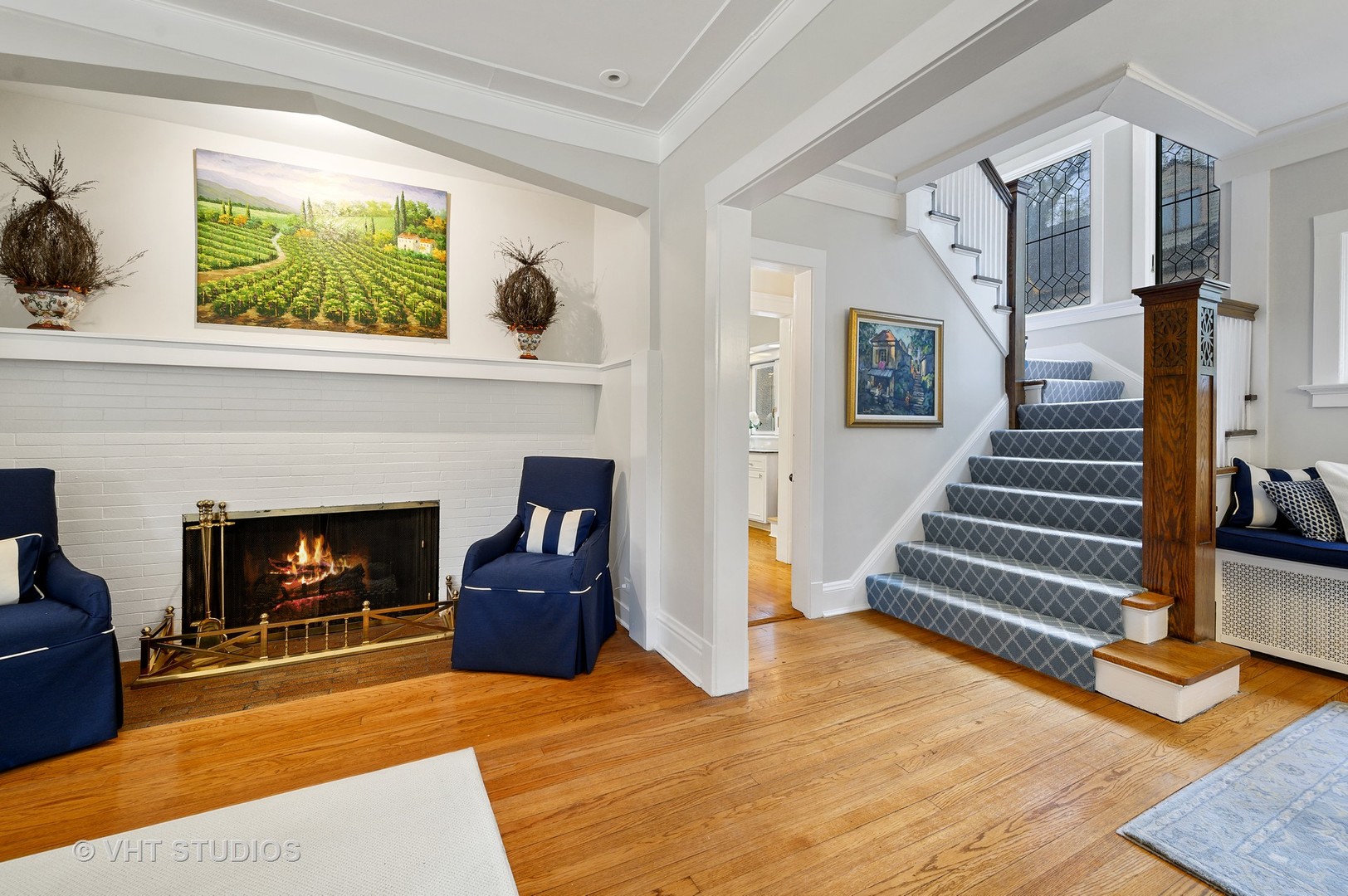 304 Cumnor Road Kenilworth, IL 60043 - Photo 8 of 40 a living room with furniture and a fireplace