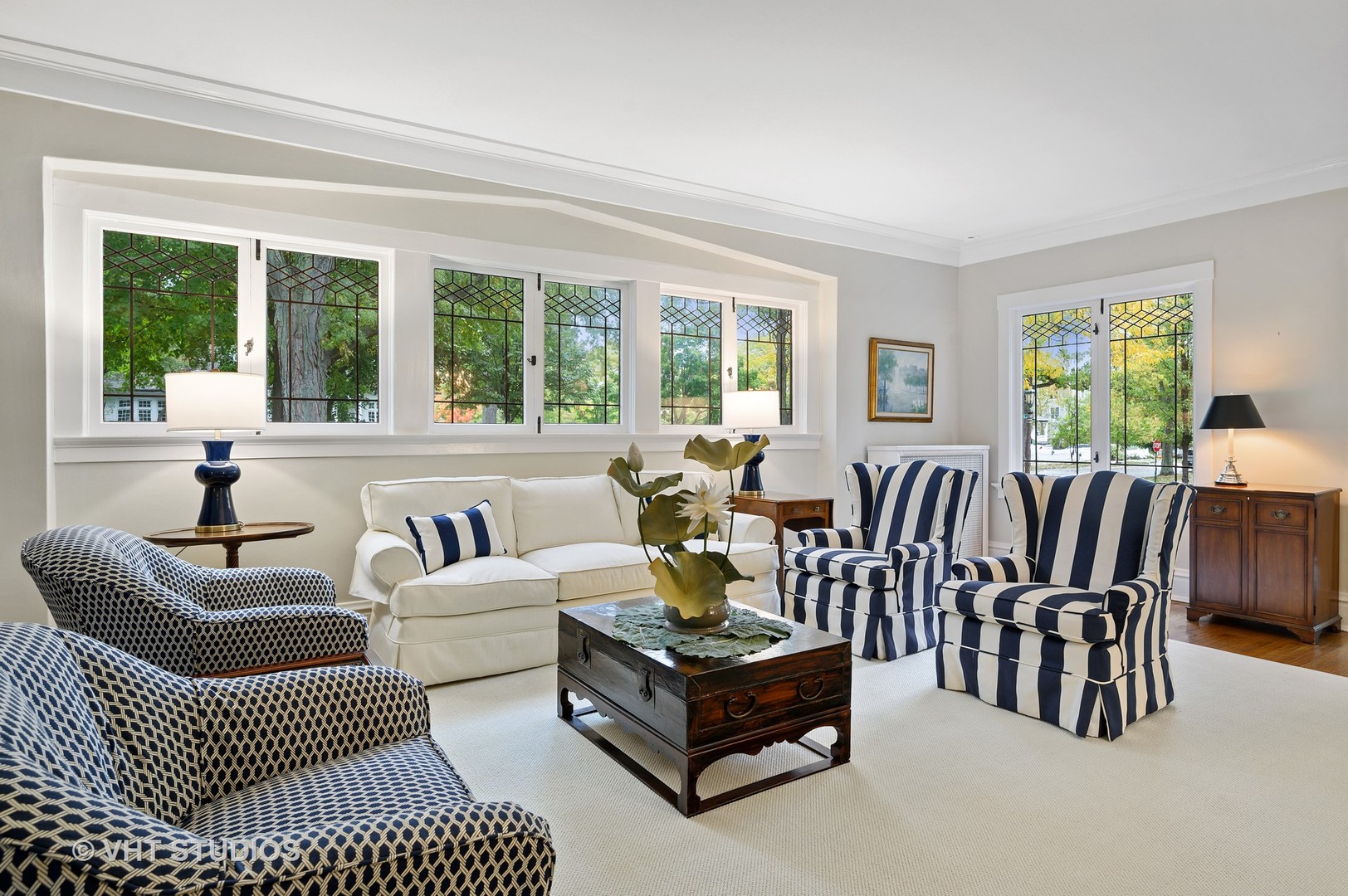 304 Cumnor Road Kenilworth, IL 60043 - Photo 9 of 40 a living room with furniture and a large window