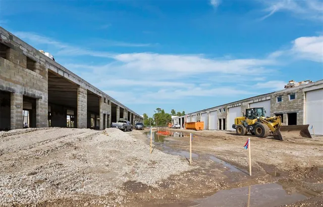 a view of a street with cars