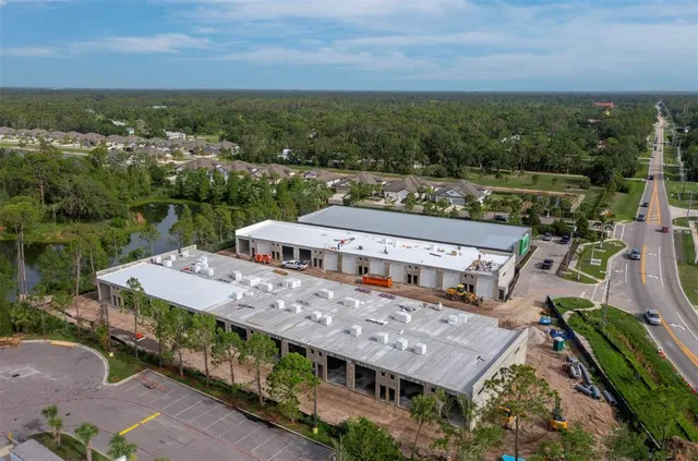 an aerial view of a house with a garden