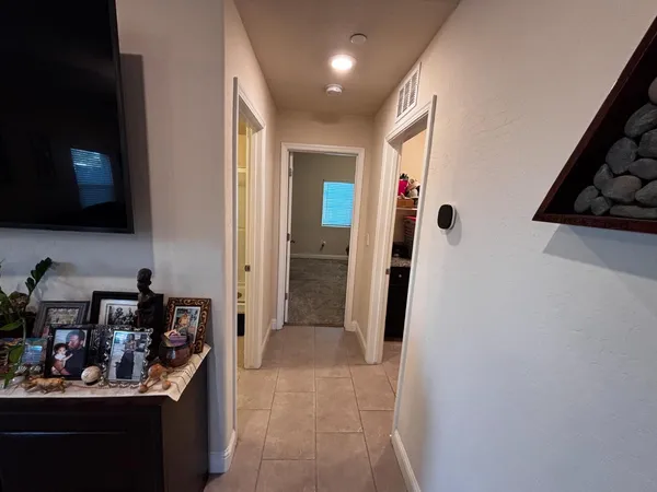 a bedroom with a bed and a closet