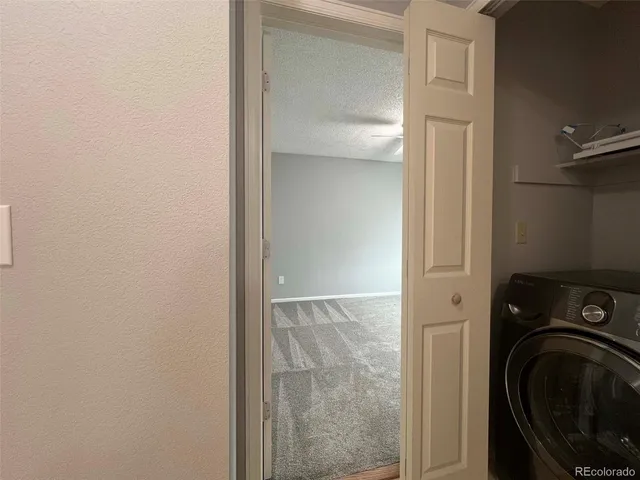 a view of a bathroom with washing machine