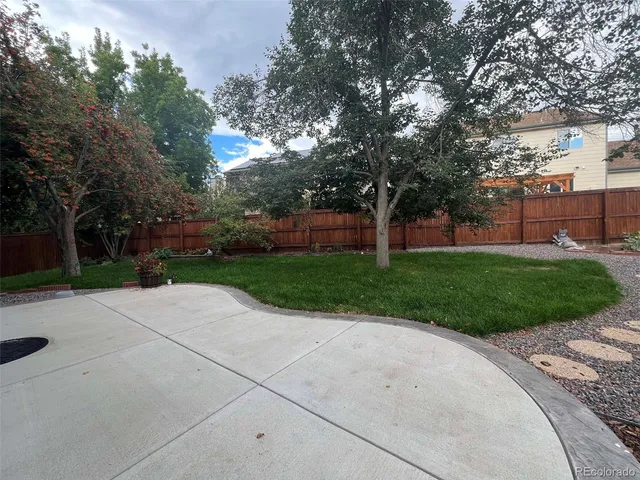 a view of a backyard with green space