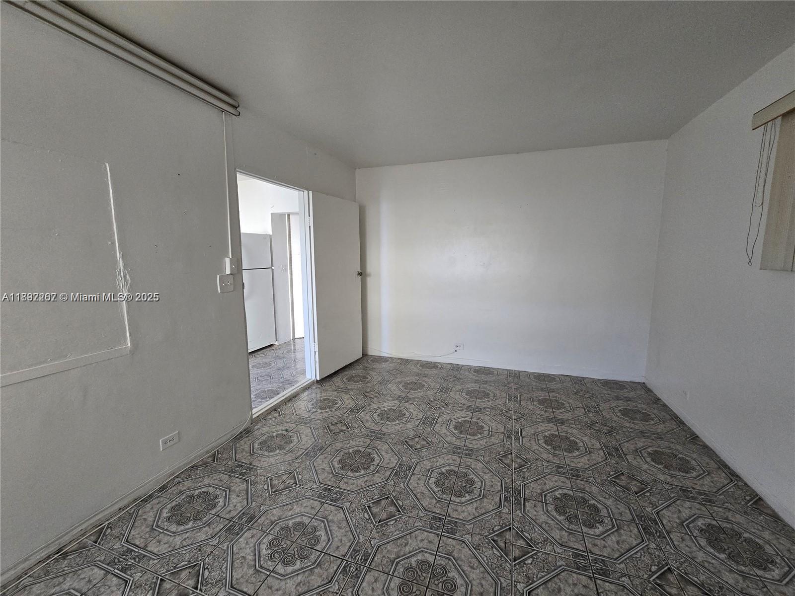 70 Northwest 77th Street, Unit 11 Miami, FL 33150 - Photo 13 of 17 a view of empty room
