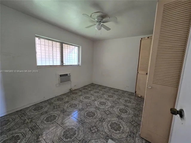 a view of a window in an empty room