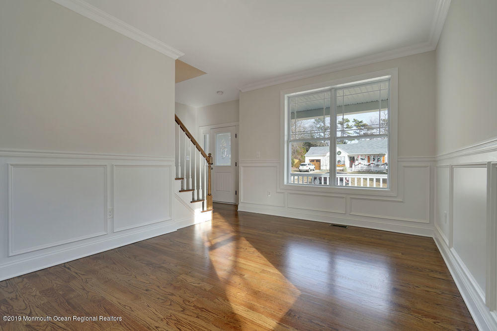 113 Lanyard Road Manahawkin, NJ 08050 - Photo 16 of 71 a view of an entryway with wooden floor