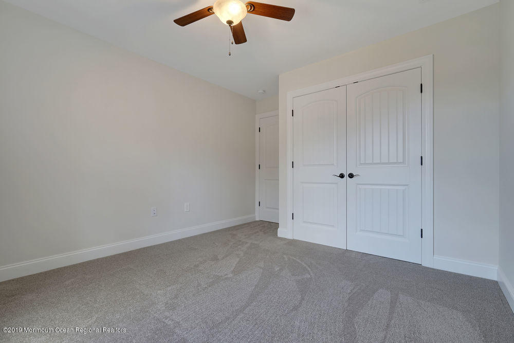 113 Lanyard Road Manahawkin, NJ 08050 - Photo 44 of 71 wooden floor in an empty room