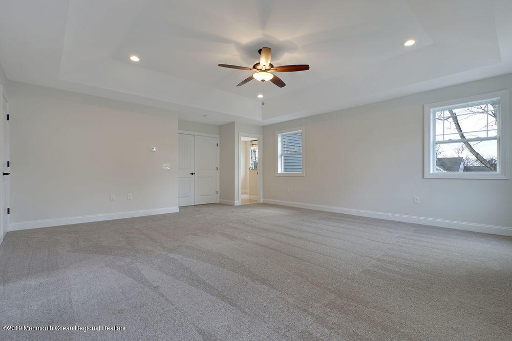 113 Lanyard Road Manahawkin, NJ 08050 - Photo 48 of 71 a view of an empty room with a window