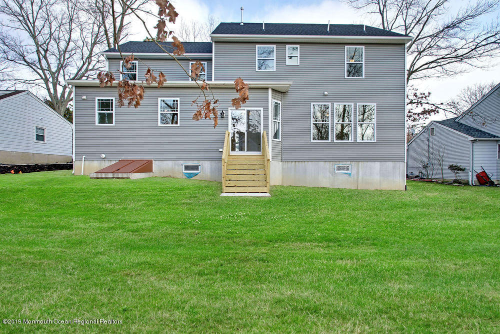 113 Lanyard Road Manahawkin, NJ 08050 - Photo 61 of 71 a front view of house with yard