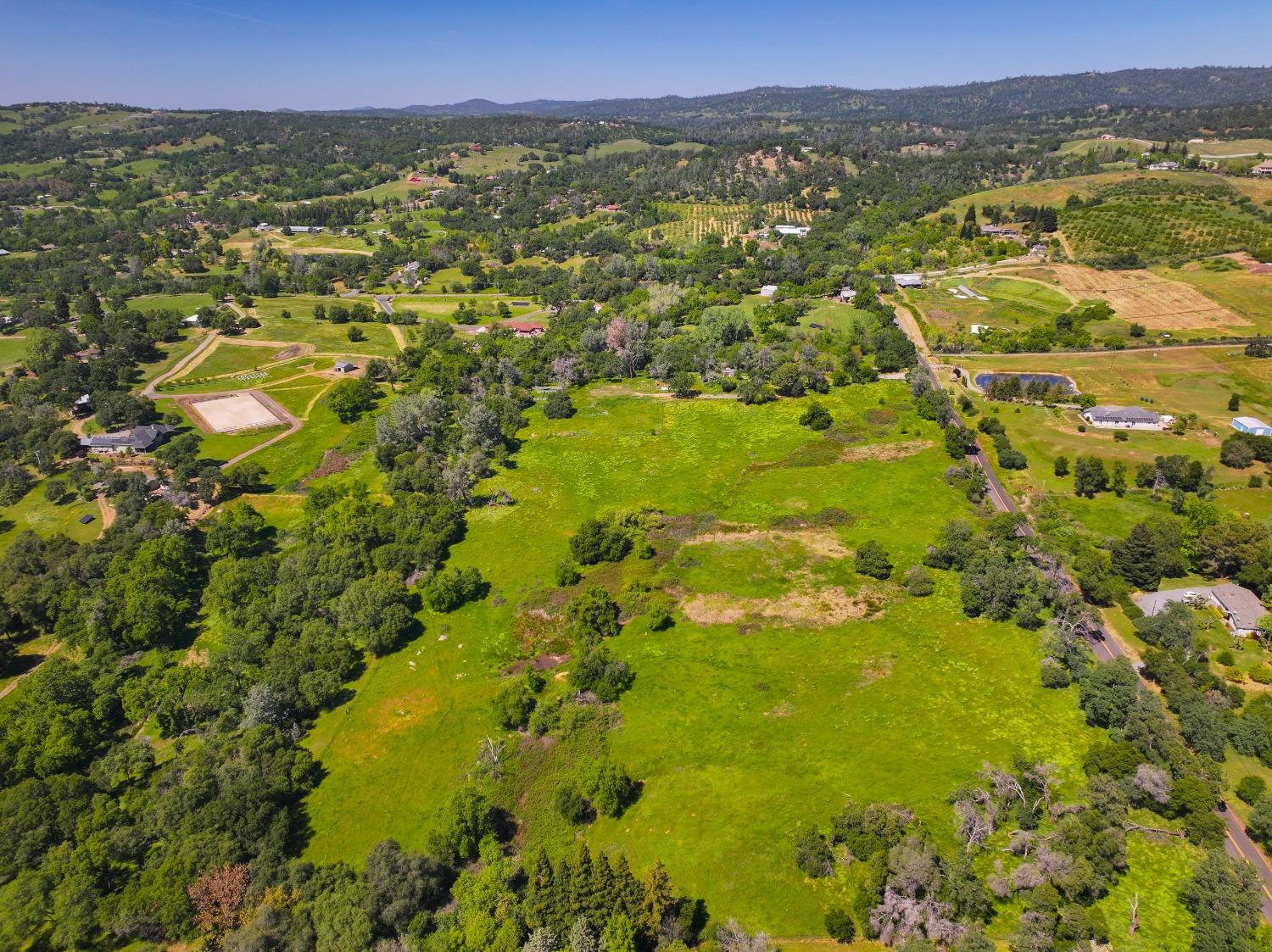6174 Mt Pleasant Road Lincoln, CA 95648 - Photo 3 of 7 a view of a lake with mountains in the background