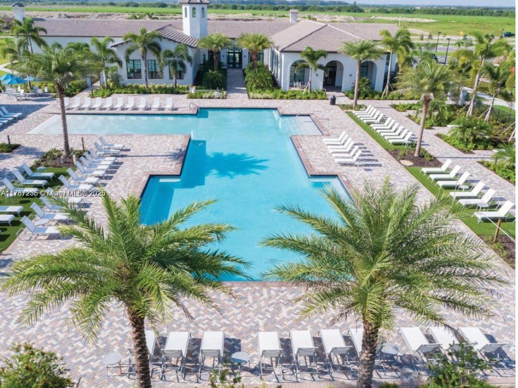 5277 Marano Drive Ave Maria, FL 34142 - Photo 20 of 23 a view of an outdoor space and swimming pool