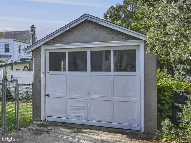 a view of a house with a small yard