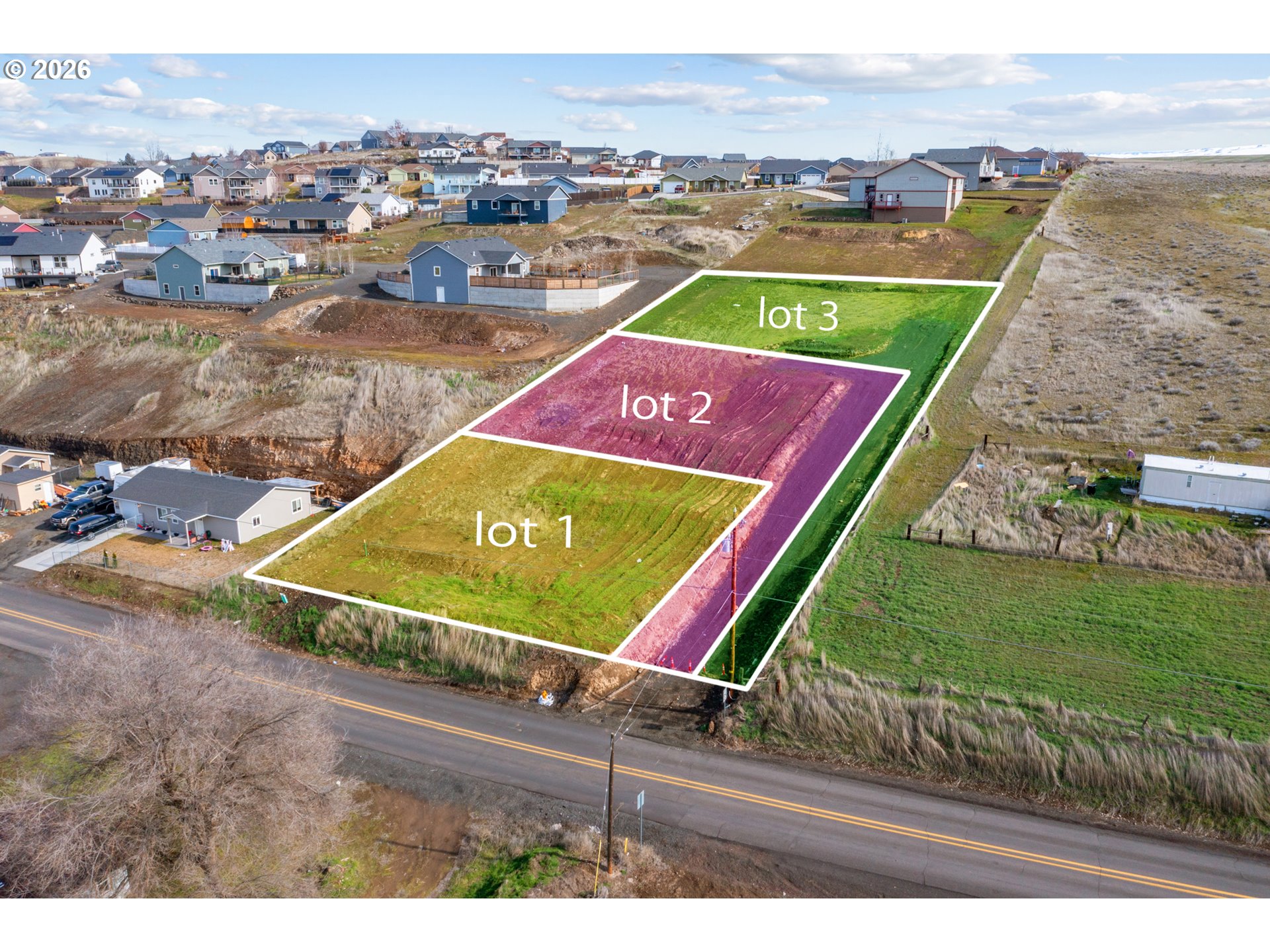 3 Tutuilla Road Pendleton, OR 97801 - Photo 2 of 11 an aerial view of a tennis ground and a cars park side of the road