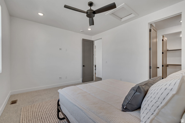 1302 1475 East, Unit 40 Payson, UT 84651 - Photo 21 of 34 Bedroom with recessed lighting, light carpet, and a ceiling fan