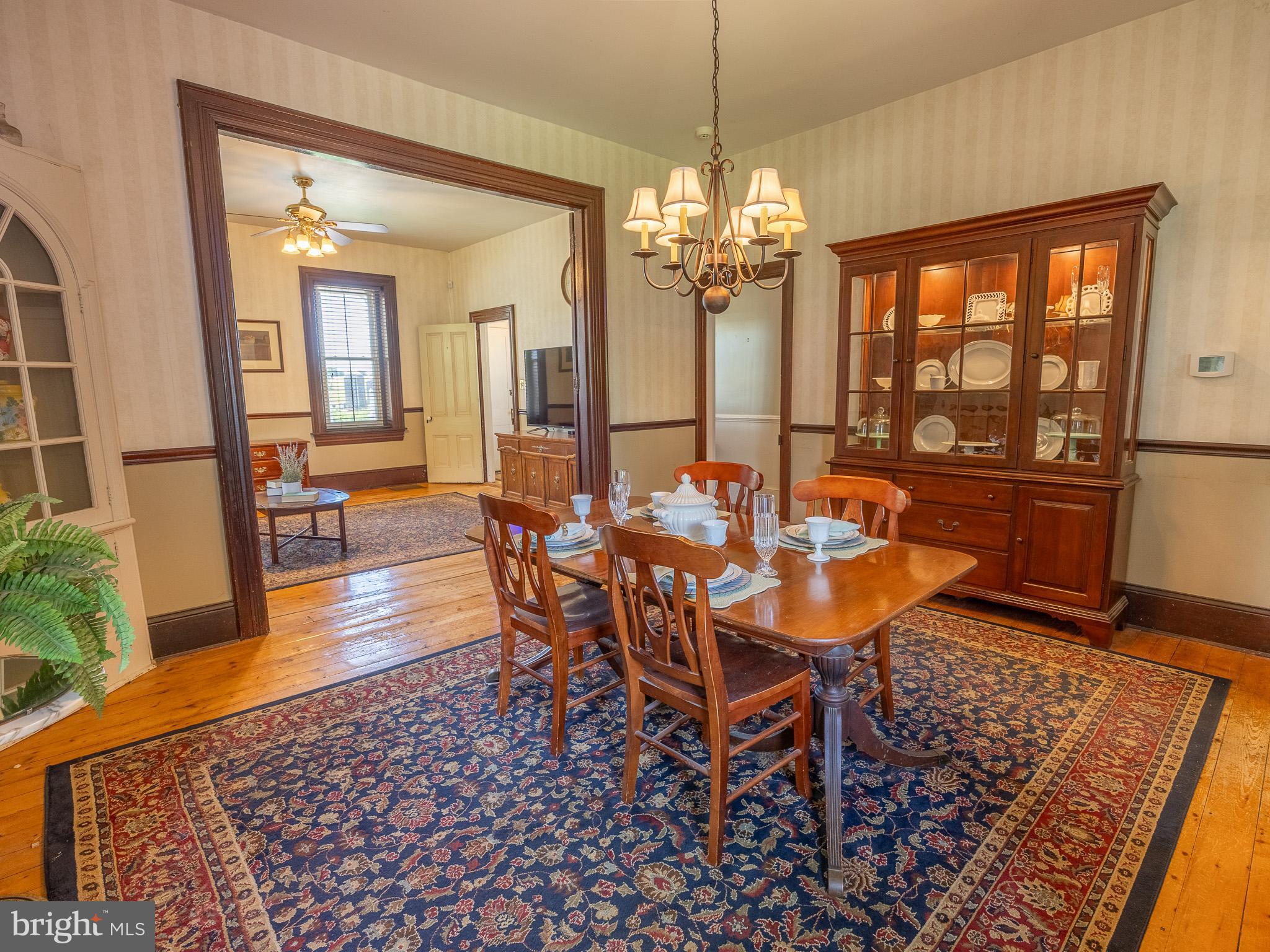 225 Niantic Road Barto, PA 19504 - Photo 26 of 82 a view of a dining room with furniture wooden floor and chandelier