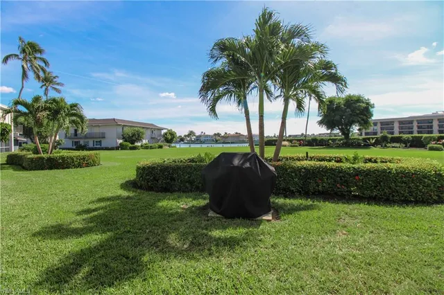 a view of a garden and basketball court