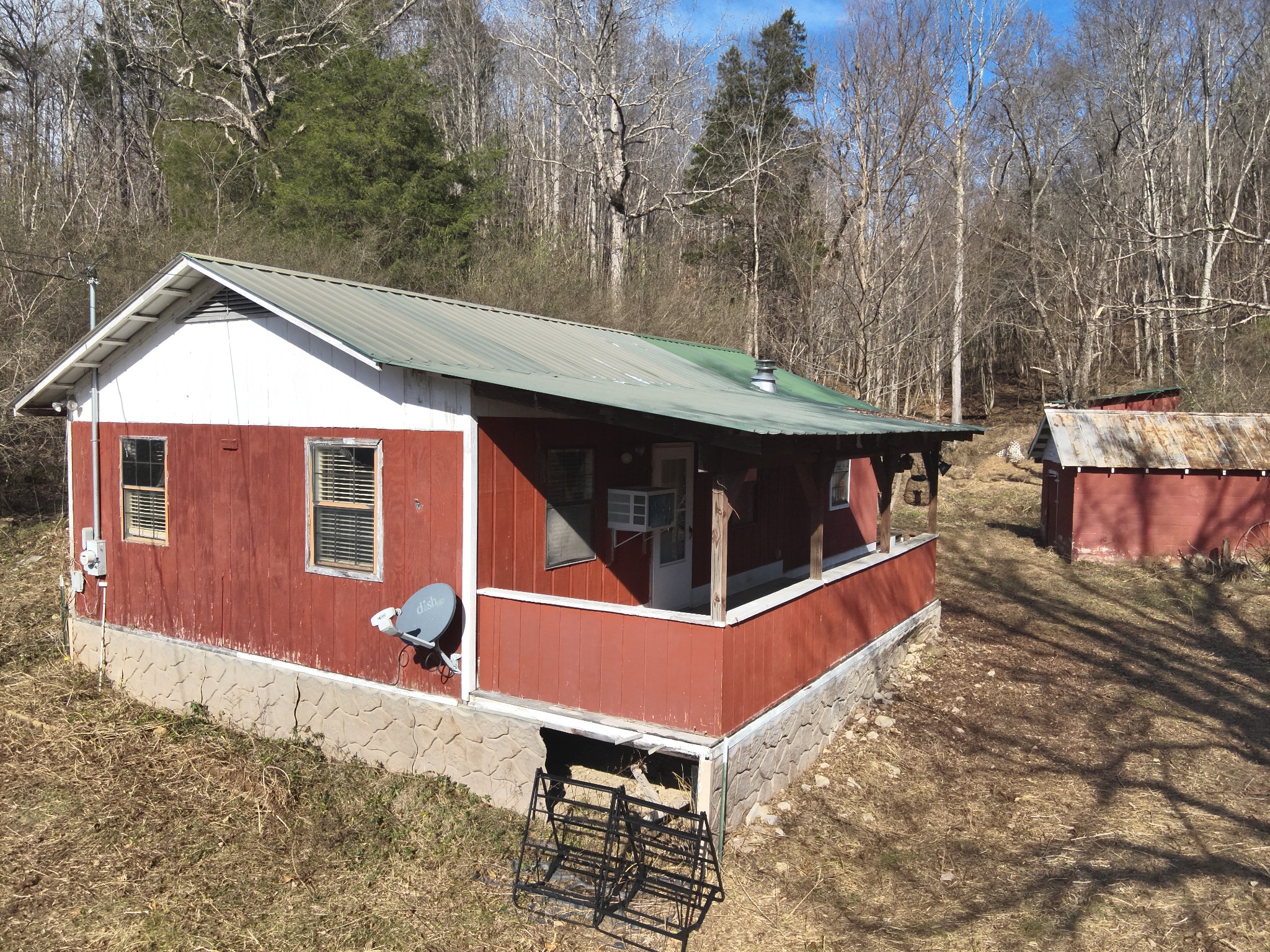 3385 Rockhouse Road Linden, TN 37096 - Photo 11 of 46 a view of a house with a yard and sitting area