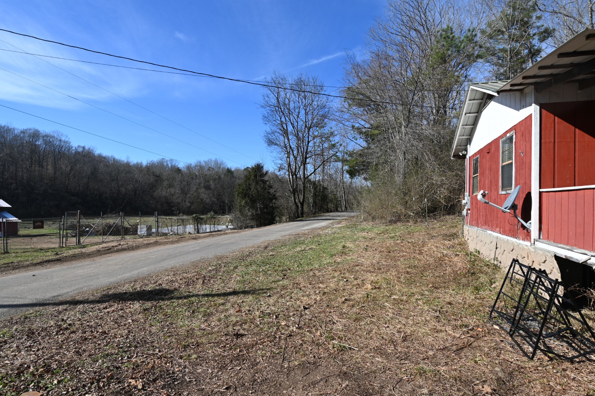 3385 Rockhouse Road Linden, TN 37096 - Photo 45 of 46 a backyard of a house with lots of green space