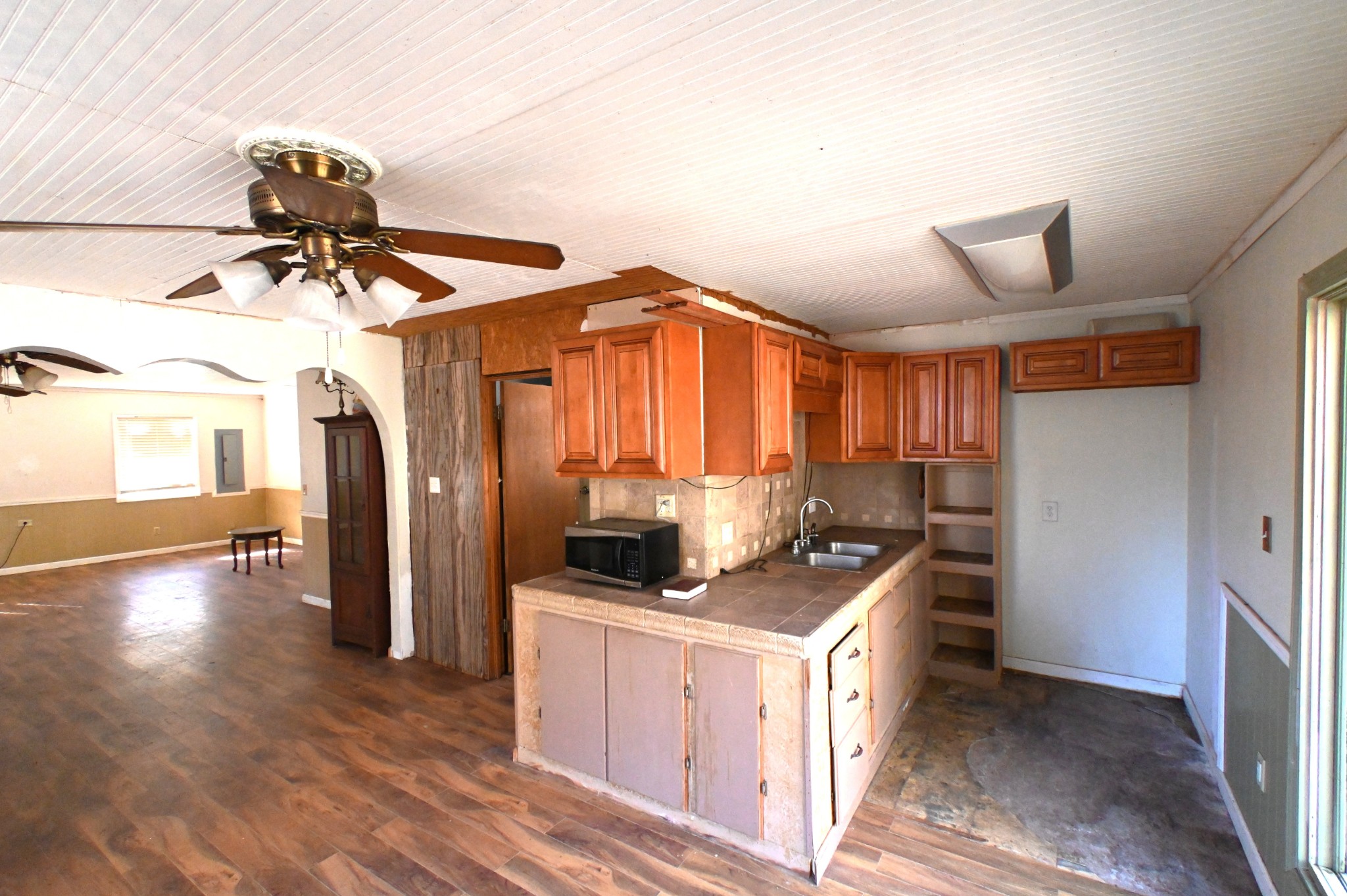 3385 Rockhouse Road Linden, TN 37096 - Photo 6 of 46 a kitchen that has a lot of cabinets a sink and a stove