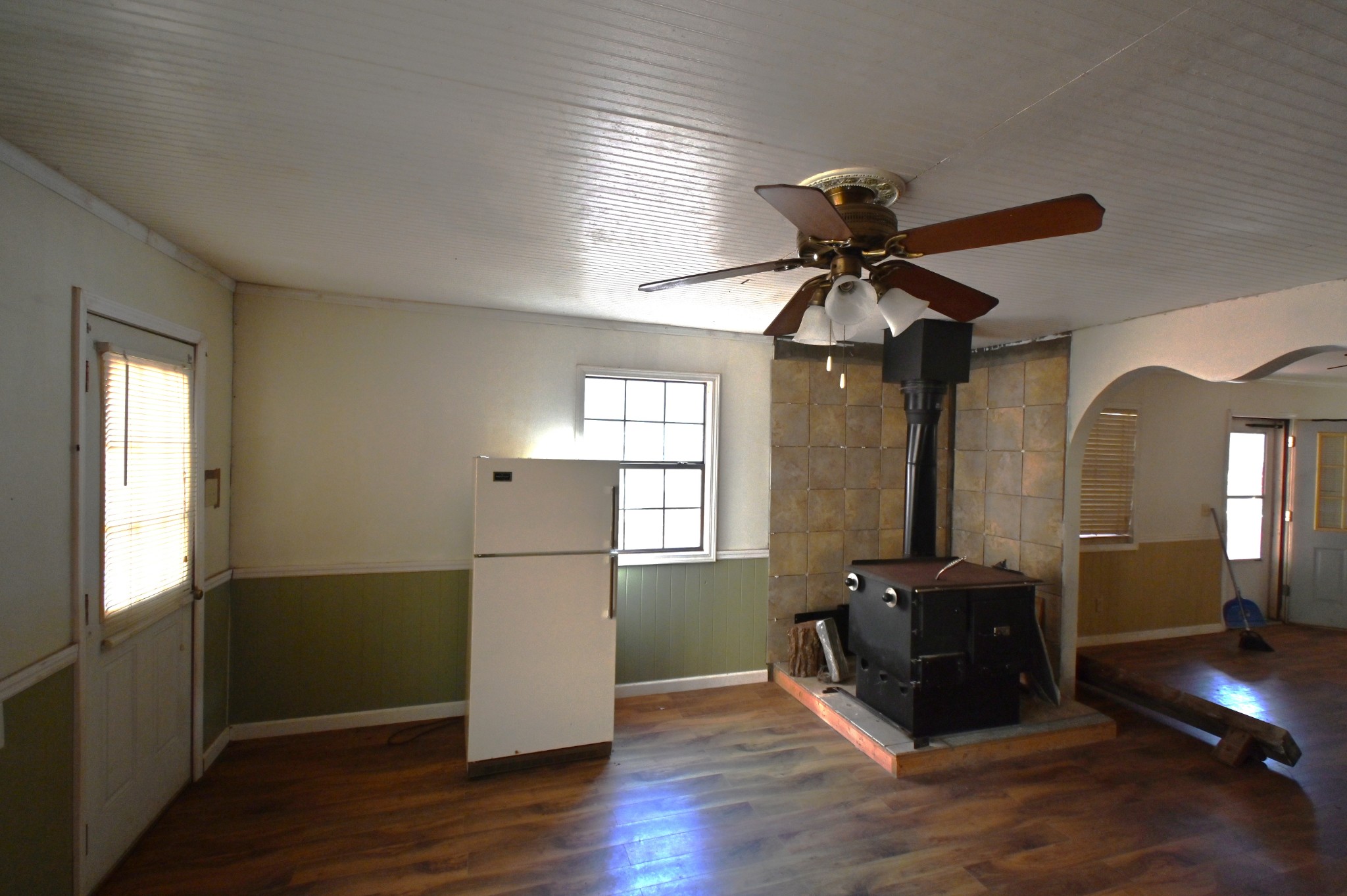 3385 Rockhouse Road Linden, TN 37096 - Photo 7 of 46 a view of a livingroom with hardwood floor and a ceiling fan
